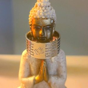 Ohm ring. Nearly a size 7. Never been worn.